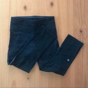Black Lululemon crop leggings, mesh details